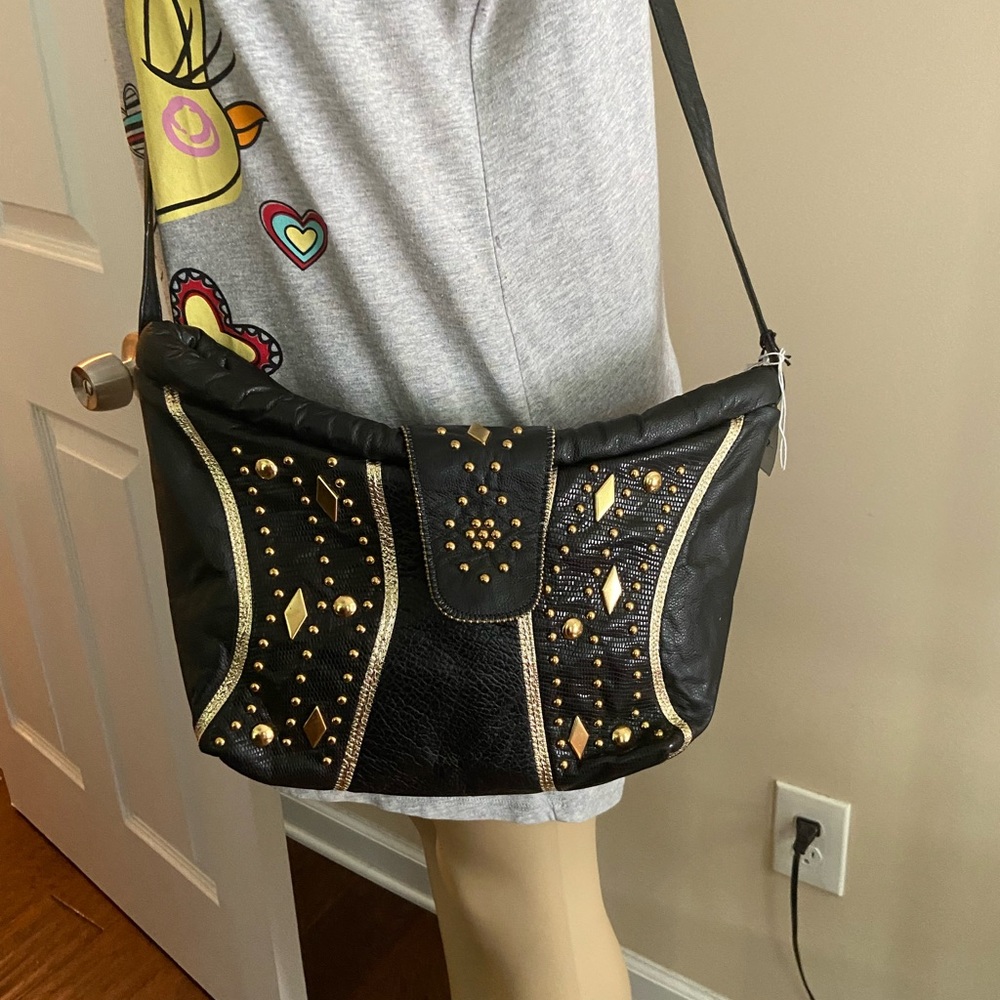 Vintage Gold studded genuine leather canoe shaped cross body bag